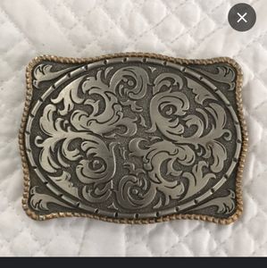 Vintage Storming Silver belt buckle w Gold trim. $75. Asheville NC